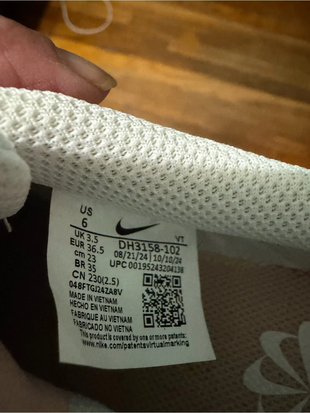 Nike Women’s White Sneakers with Rose Pink Swoosh